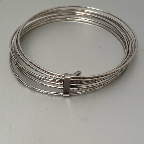 Seven silver tone attached bangle brackets. Used - Picture 4 of 6